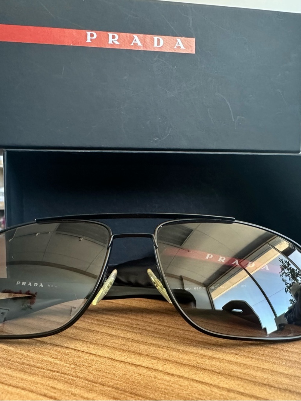 Prada Black and Gold Aviator Sunglasses